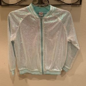 Adorable sequin girls sea foam green coat with satin interior. Size large.